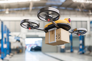 Flying drone delivering a packet