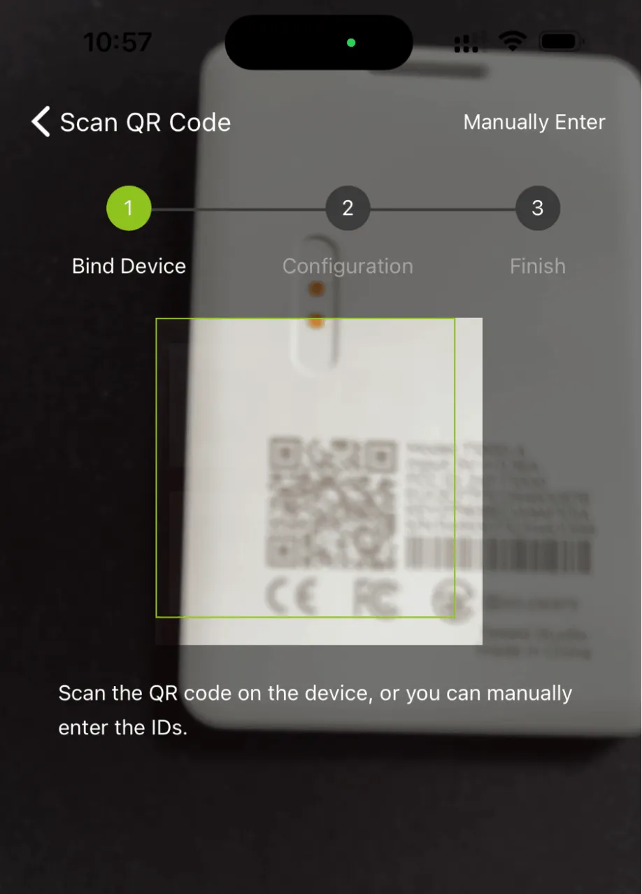 Allow access to the camera and scan the QR code behind the tracker